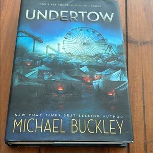 Buckle Undertow Hardcover with Silver and Blue Accents